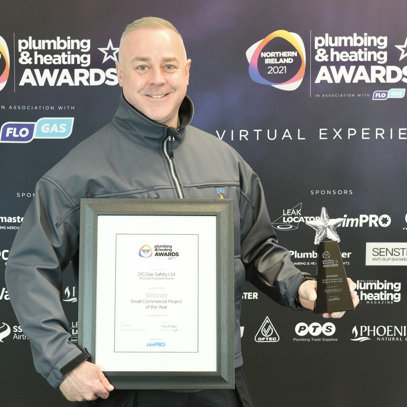 Glenn with award